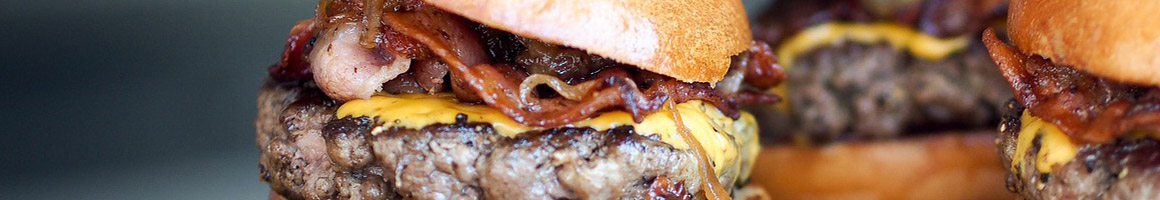 Eating Burger at John's Drive-In Hamburgers restaurant in Huntington Park, CA.